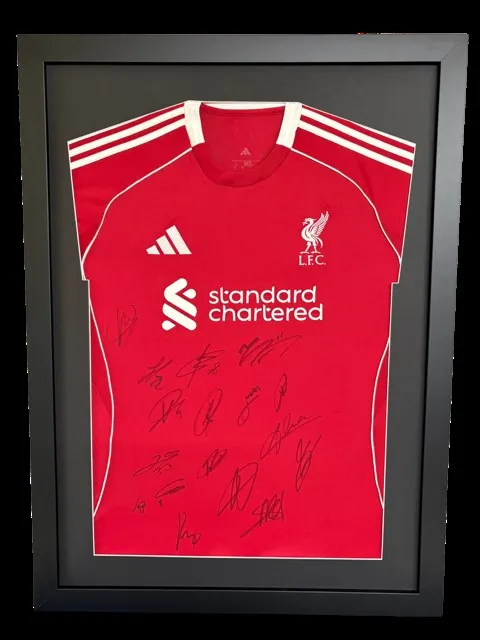 Signed Liverpool FC shirt in a black frame with a custom-cut mount