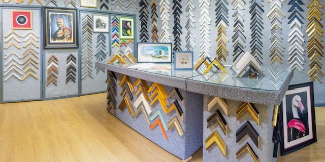 Picture framing studio Belfast showing bespoke frame samples and mouldings